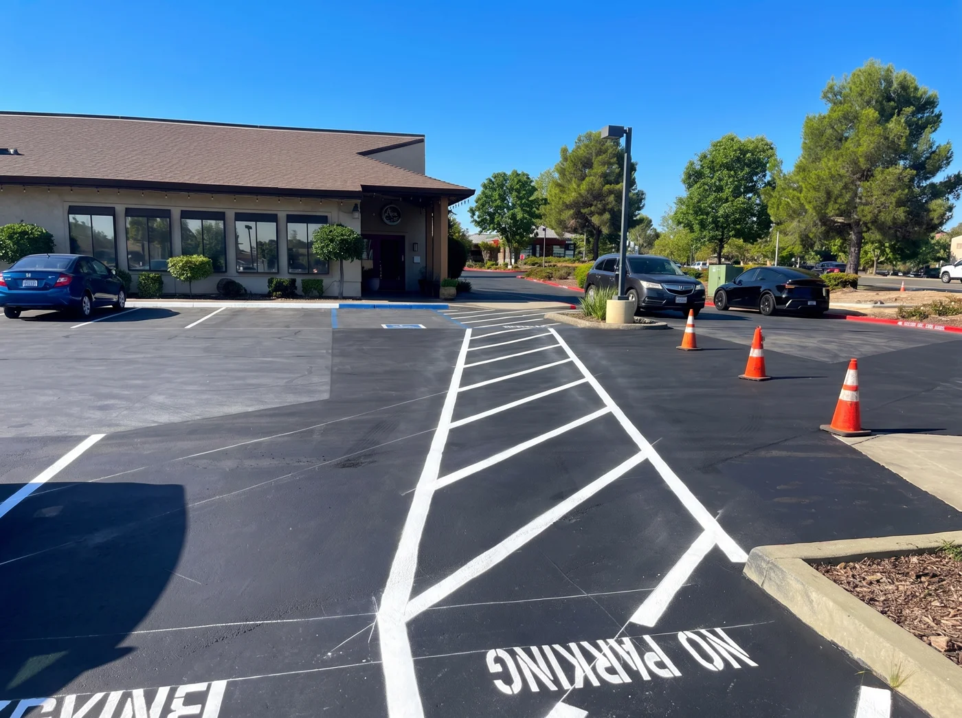 Asphalt parking area outside a commercial building