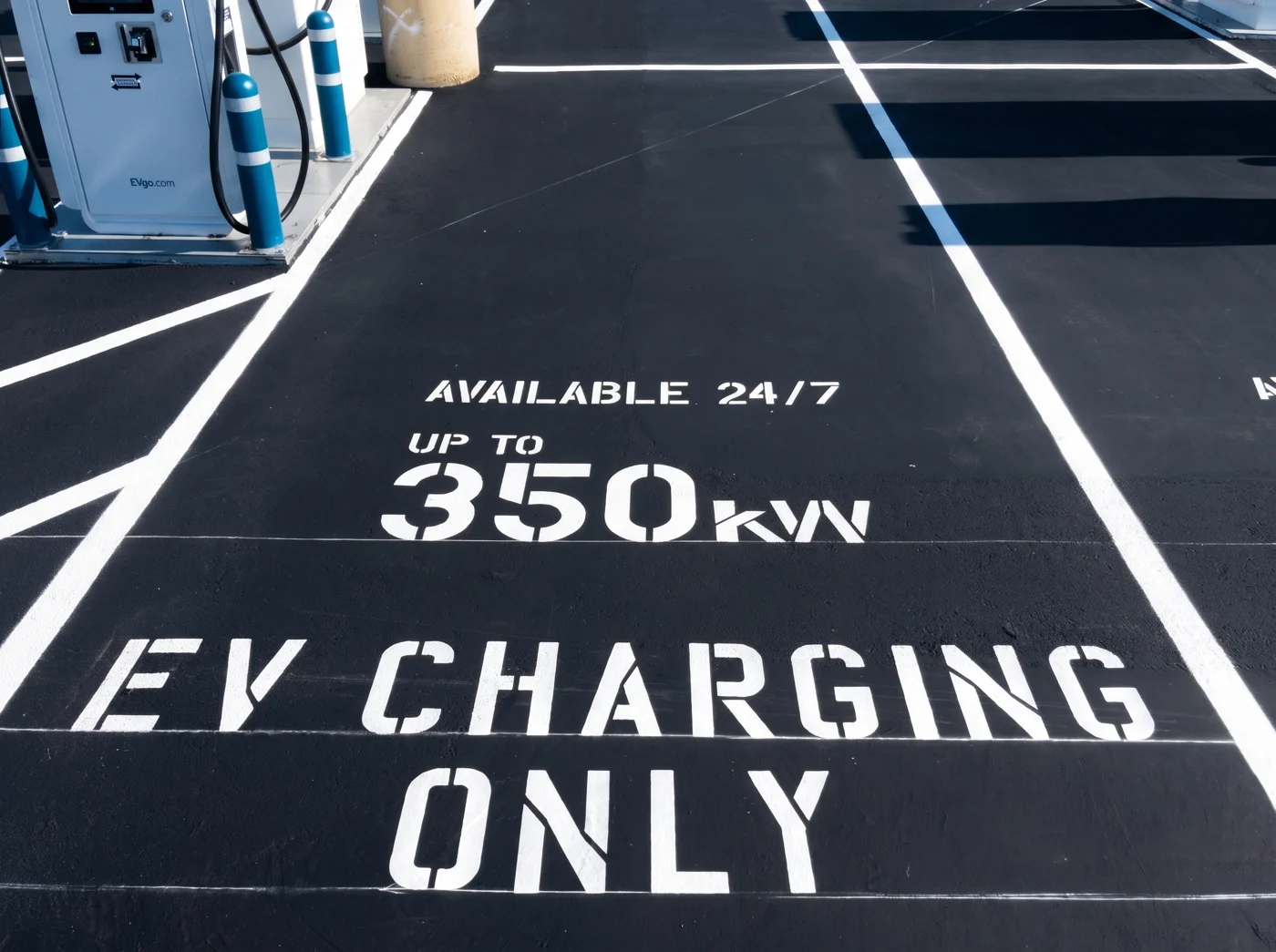 Detailed view of the paved surface in an EV charging stall